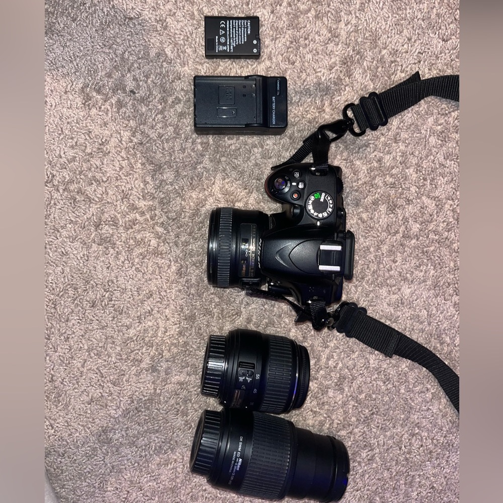 Nikon D3200 Camera. Includes Battery, 3 Nikon Lenses, Battery Charger, and Case.